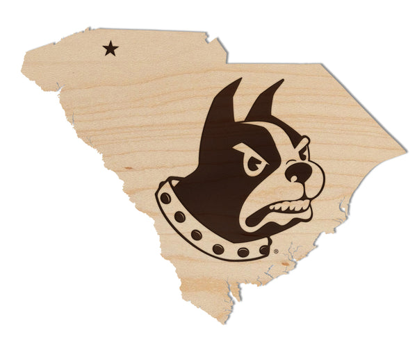 A wooden map of South Carolina with a black and white illustration of a dog's head wearing a collar with a star on it.