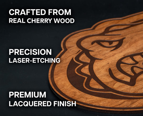 a wooden object with a carved design, including a face and a mouth, and it is described as a "crafted from real cherry wood" and "precision laser-etching".
