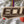 Load image into Gallery viewer, East Carolina University Flying ECU on State Ornament – Crafted from Cherry and Maple Wood –ECU Pirates

