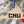 Load image into Gallery viewer, Christopher Newport University Initials on State Ornament – Crafted from Cherry and Maple Wood – CNU Captains
