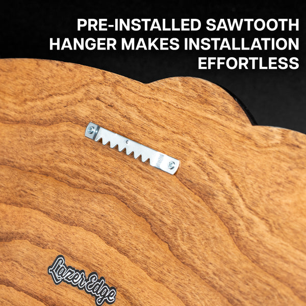 a wooden surface with a metal bracket attached to it, indicating that a pre-installed sawtooth-style hanger is being used for installation.