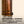 Load image into Gallery viewer, a wooden door with a text overlay that reads "INCLUDED WALL BUMPERS PROTECT YOUR WALL AND MAKE YOUR PIECE POP".

